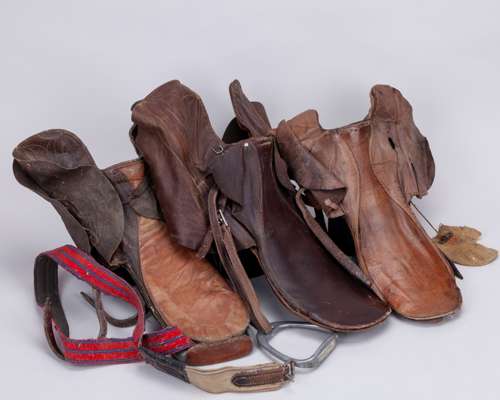 Three vintage leather jockey saddles