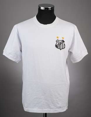 Pele white Santos No.10 jersey early 1970s,
 by Athleta, short-sleeved, two gold stars above S.F.C. badge, minor marks but overall good condition; sol