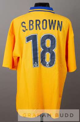 Two Macclesfield Town no.9 jersey's, 
 comprising Steve Brown yellow and blue Macclesfield Town no.18 away jersey, circa 1999,
 by Silkman Leisure, sh