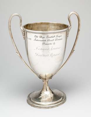 The trophy for the Old Boys Football League Intermediate South Division 'Bruce Cup' as presented by Nemean Football League,
 in the form of a twin-han