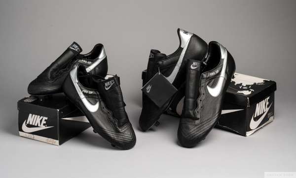 Two pairs of vintage Nike PRO III football boots, 
 size 39 and 45, black and silver, model 17712, in original boxes, one box marked with incorrect si