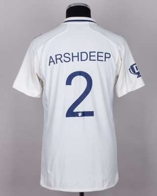 A Singh white and navy No.2 India v. England match issued, autographed Red For Ruth shirt