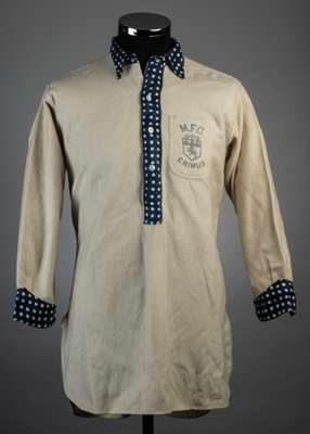 A rare and possibly unique Middlesbrough circa.1886-1890 match worn jersey, 
 with button up collar and front with embroidered badge inscribed "M.F.C"