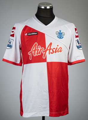 The red and white quartered Queen's Park Rangers no.34 third choice jersey worn by Taye Taiwo in the famous match v Manchester City, played at Etihad 