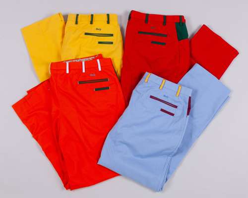 Eight pairs of Ian Botham Beefy golfing trousers in the colours of the ODI cricketing nations
