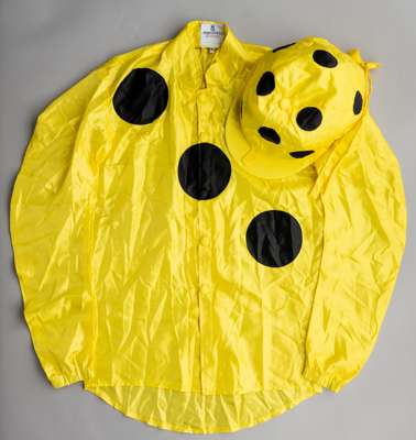 Sheikh Mohammed Obaid Al Maktoum racing silks,
 bearing Allertons maker's label, size 36, yellow jacket with three diagonal black spots, yellow cap wi