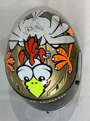 Valentino Rossi #46 (Italy) signed 2010 AGV  Helmet “The Chicken”, 
 Signed on top of the helmet in black permanent marker Worn in 2010, is the full-f