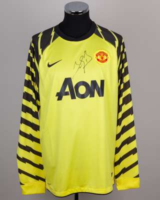 A yellow and black David De Gea autographed Manchester United replica shirt