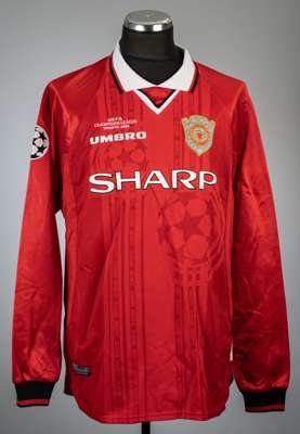Dwight Yorke red Manchester United no.19 home jersey, season 1999-2000,
 Umbro, long-sleeved with UEFA STARBALL sleeve badge, club crest and embroider