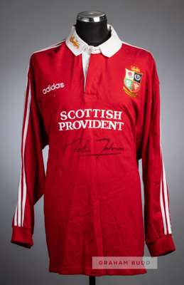 Martin Johnson signed British Lions South Africa 1997 Tour replica jersey,
 the red jersey with white collar embroidered with gilt lion rampant and em