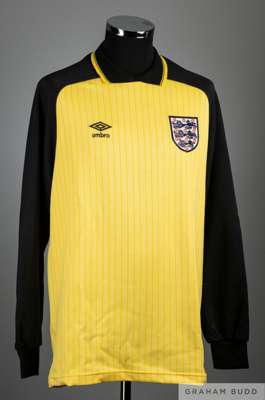 Peter Shilton yellow No.1 England International match worn goalkeepers shirt, 1984-86, 
 Umbro, L, with crew-neck collar and embroidered three lion cl