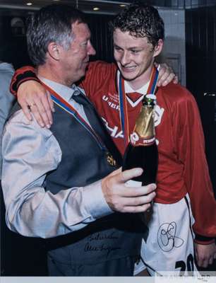Limited edition colour autograph photograph of Alex Ferguson and Ole Gunnar Solskjaer
 celebrating the 1999 Champions League victory, No.100 of an edi
