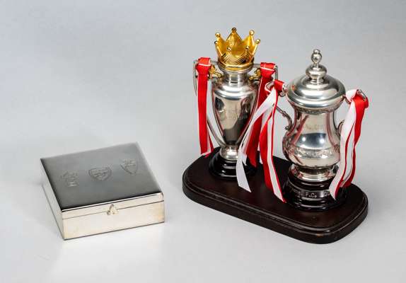 Two miniature trophies commemorating Arsenal's Double Winning season 2001-02