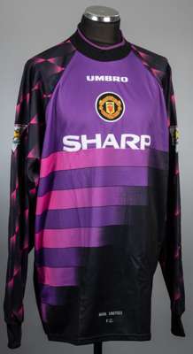 Peter Schmeichel purple and black Manchester United no.1 goalkeeper's jersey, season 1996-97,
 Umbro, long-sleeved with THE FA PREMIER LEAGUE CHAMPION