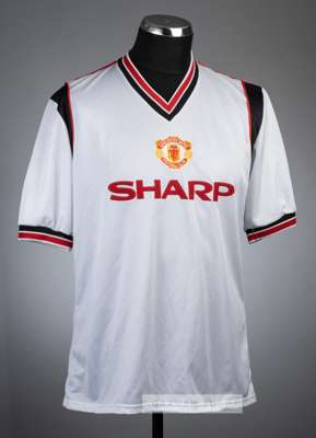 White Manchester United No.14 substitute's away jersey, season 1984-85,
 Adidas, short sleeved with club crest badge, reverse numbered 14