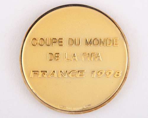 David Will: yellow-metal FIFA 1998 World Cup medal, designed by Bertoni
