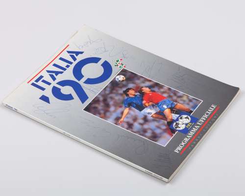An Italia 90 official programme autographed by nine members of the West Germany squad
