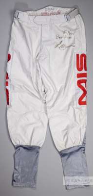Jason Maguire signed race-worn jockey breeches,
 signed and dedicated TO NEV, BEST WISHES, J MAGUIRE, in silver marker pen, bearing J.MAG written abov