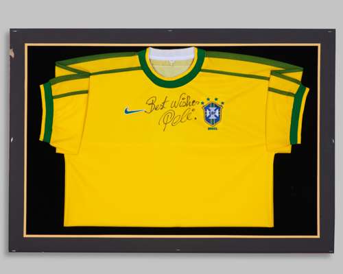 A yellow Brazil football shirt autographed by Pele