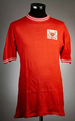 Red Nottingham Forrest no.7 home jersey, circa 1968,
 Umbro, short-sleeved, elasticated round neck collar and cuffs, with white hoops, embroidered clo