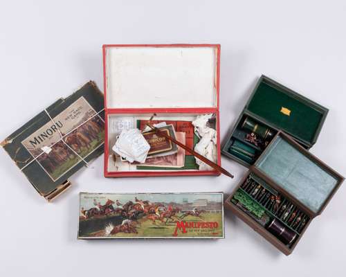 Two similar boxed horse racing games