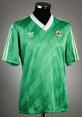 Green Northern Ireland No.16 jersey, 
 Adidas, short-sleeved with national emblem and Adidas logo, reverse numbered 16, size 40-42in., with compliment